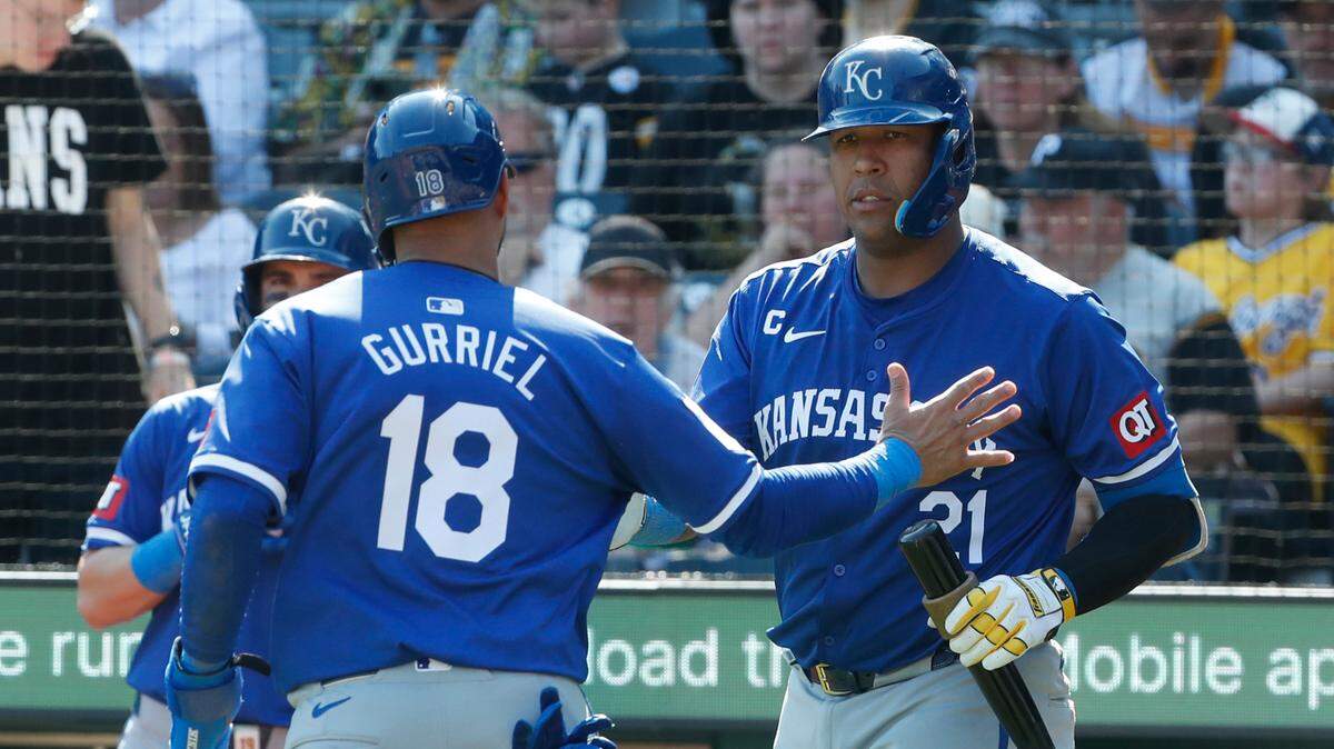 Kansas City Royals catcher Salvador Perez (right) congratulates first baseman Yuli Gurriel (18) after Gurriel scored a run against the Pittsburgh Pirates during the sixth inning at PNC Park on Sep 15, 2024 in Pittsburgh, Pennsylvania.