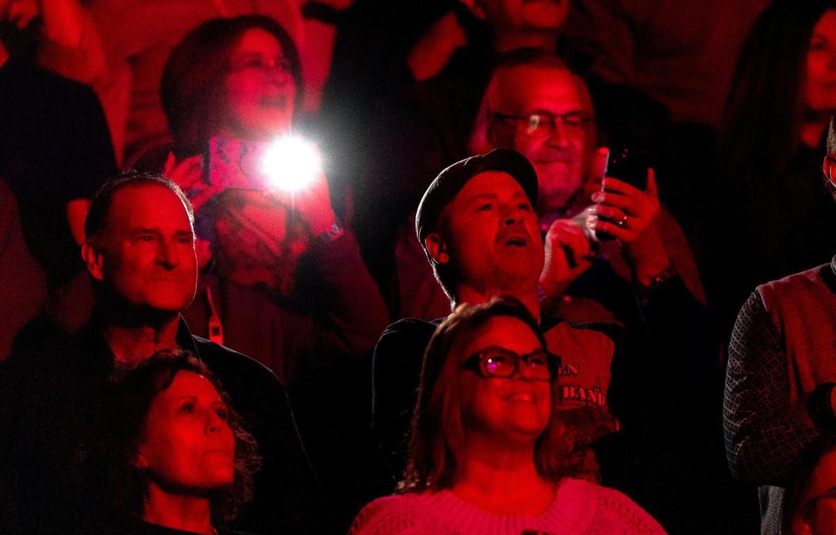 People sing along to Bruce Springsteen and The E Street Band as they perform at T-Mobile Center on Saturday, Feb. 18, 2023, in Kansas City.