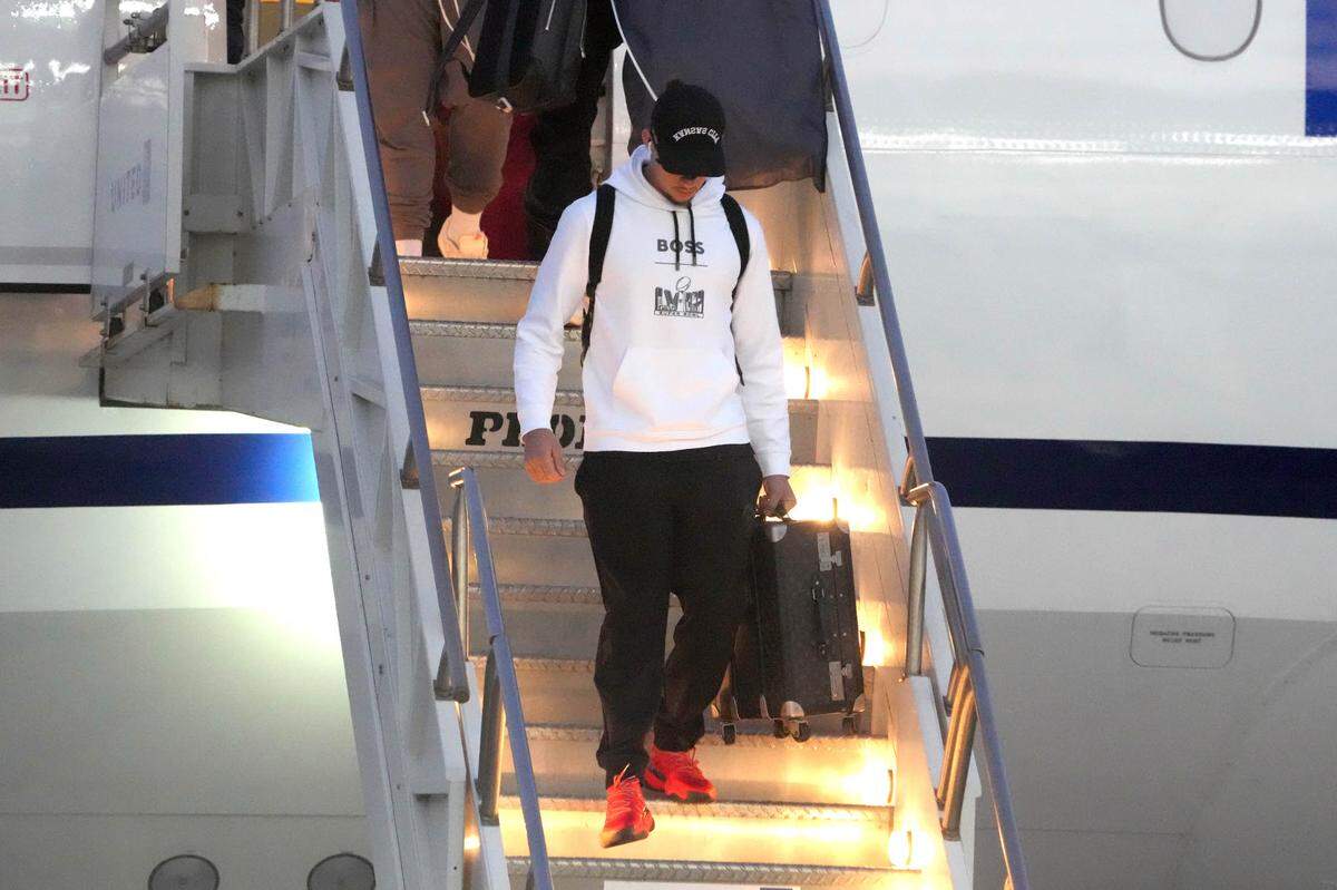 Feb 4, 2024; Las Vegas, NV, USA; Kansas City Chiefs quarterback Patrick Mahomes exits plane during Super Bowl 58 team arrivals at the Harry Reid International Airport.