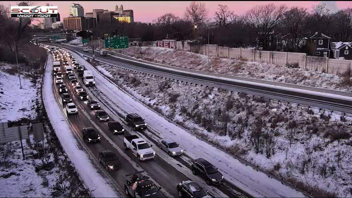 Rush hour traffic was inching along Interstate 35 on the northeast side of the highway loop in downtown Kansas City Friday morning. A winter storm that passed through the area Thursday left slick roads and brutally cold wind chills behind for the morning commute.