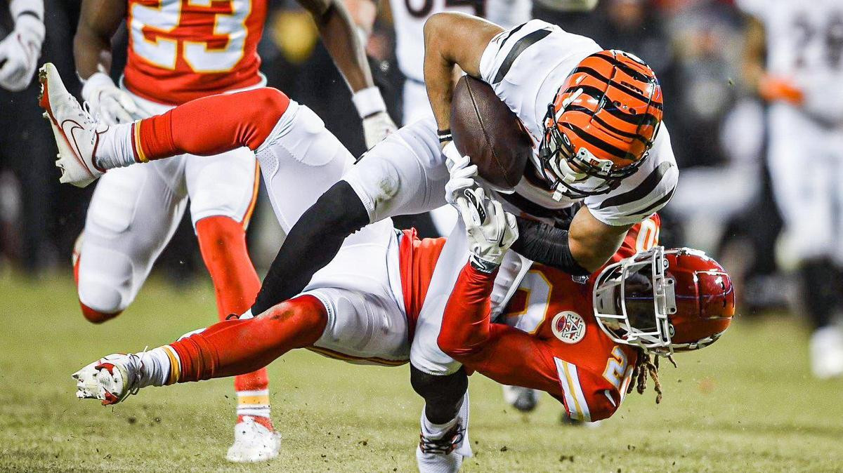 Cincinnati Bengals wide receiver Tyler Boyd is taken down by Kansas City Chiefs safety Justin Reid in the first half during the AFC Championship Game Sunday, Jan. 29, 2023, at GEHA Field at Arrowhead Stadium.