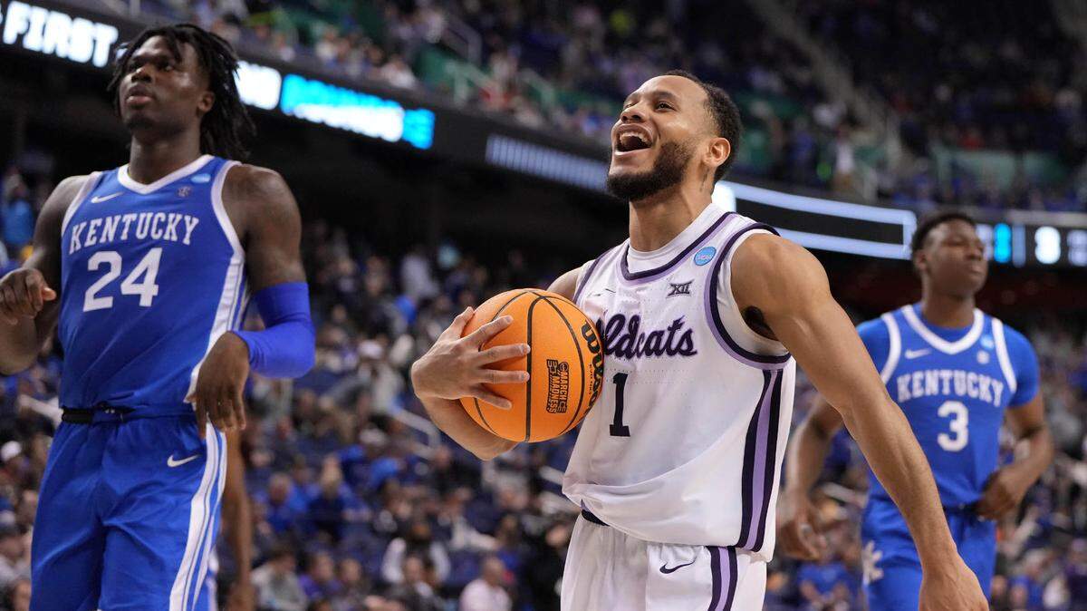 Kansas State Wildcats guard Markquis Nowell celebrates the win against Kentucky in the second round of the 2023 NCAA Tournament at Greensboro Coliseum on March 19, 2023.