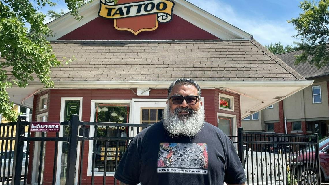 Juan Moya, 51, is a painter, muralist and tattoo artist seen standing outside Exile Tattoo shop, where he works. Moya grew up in Kansas City’s West Side and has made a name for himself incorporating Hispanic culture into his art.