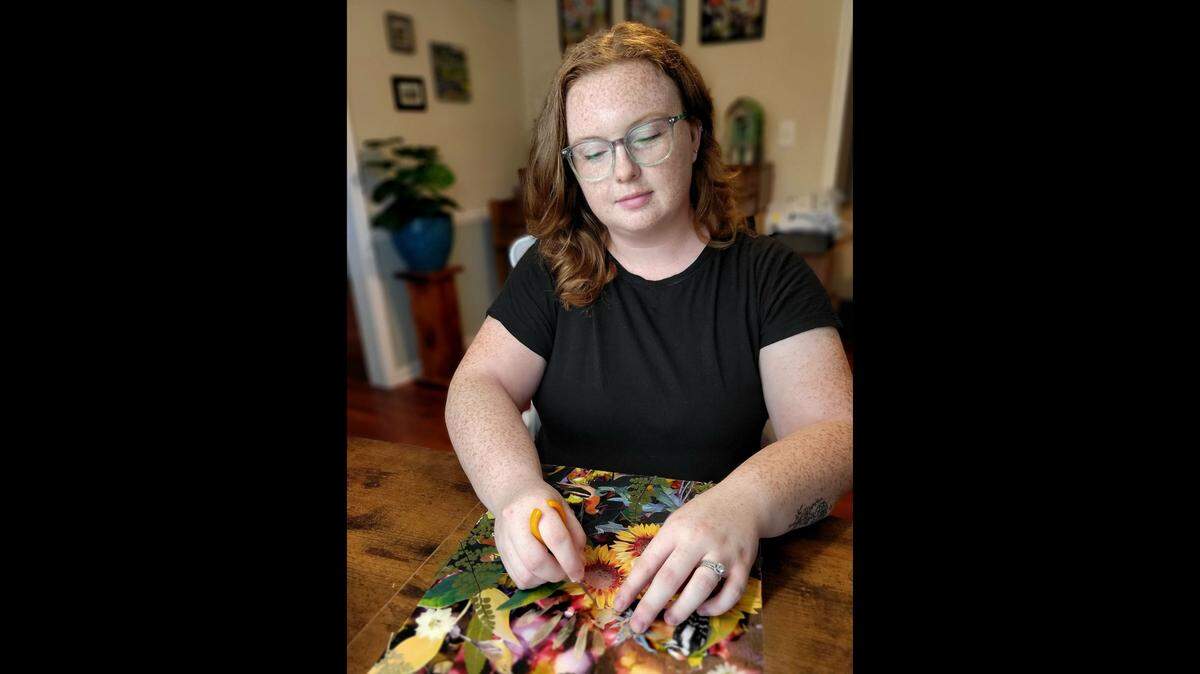 Allison Bowman of Olathe will be one of the more than 30 Kansas City-area artists at the Olathe Art Festival. Bowman, a visual artist, creates abstracted botanical mixed-media pieces.