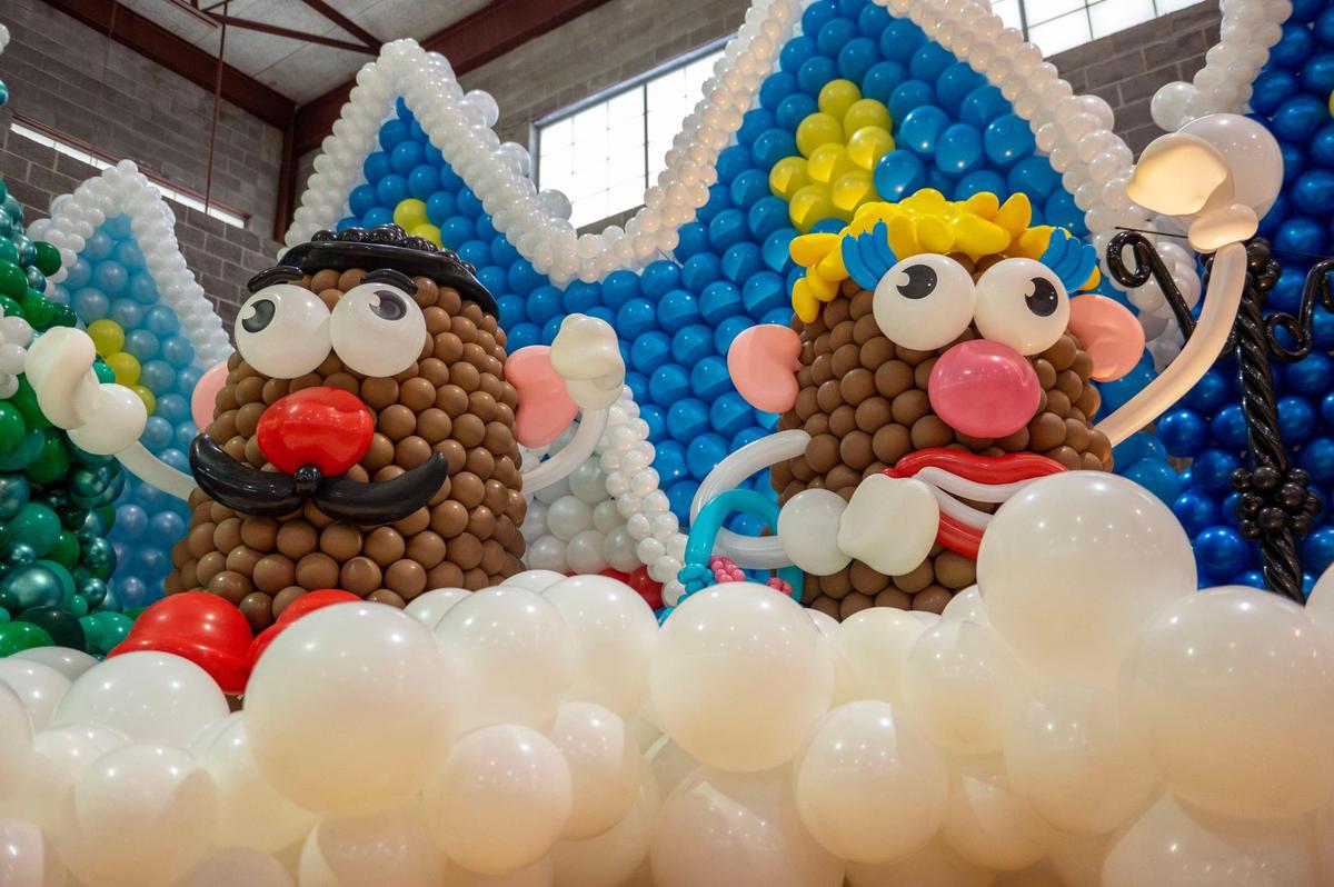 Mr. and Mrs. Potato Head were among the installations in the Big Balloon Build at Gregg/Klice Community Center on Friday, Dec. 2, 2022, in Kansas City. The event is an international festival gathering balloon artists from all over the world to create a holiday toy town.