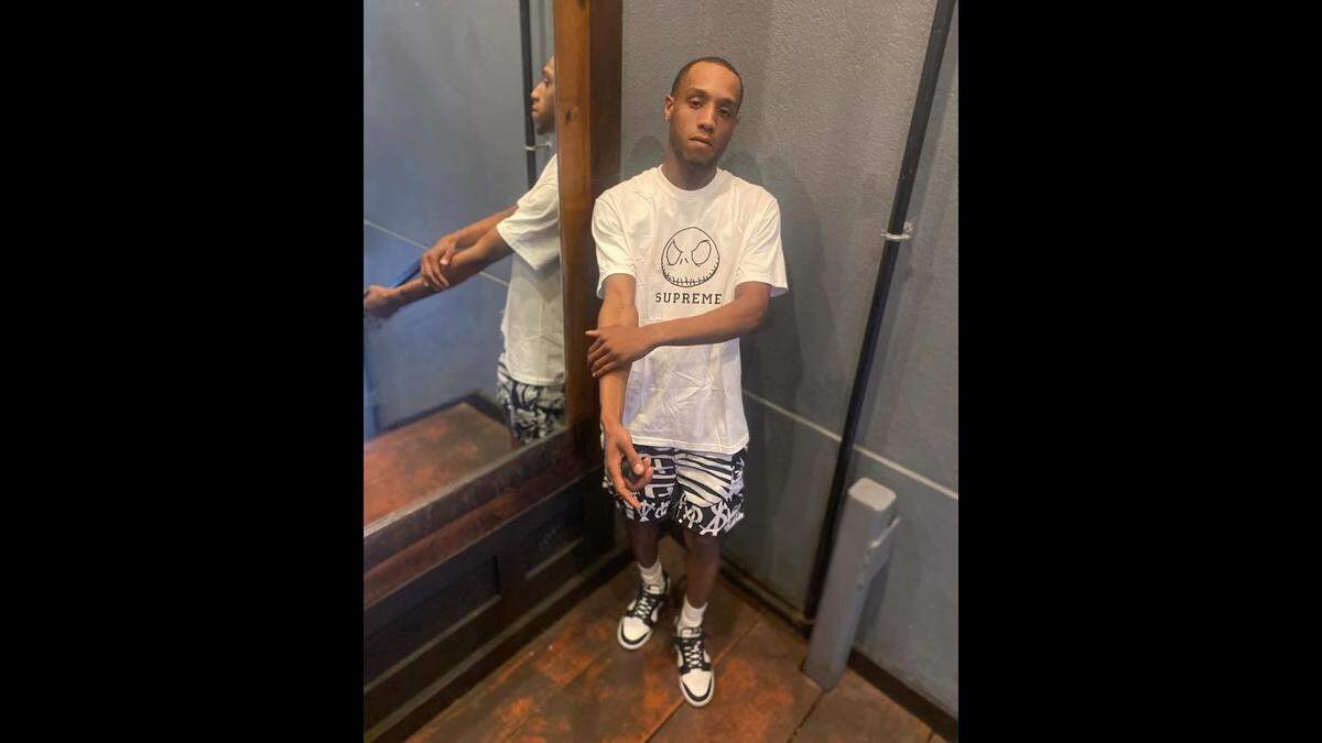 Oshaee Leneer Spinks loved buying expensive brand names, like vintage Supreme clothes and Nike sneakers, his girlfriend said.