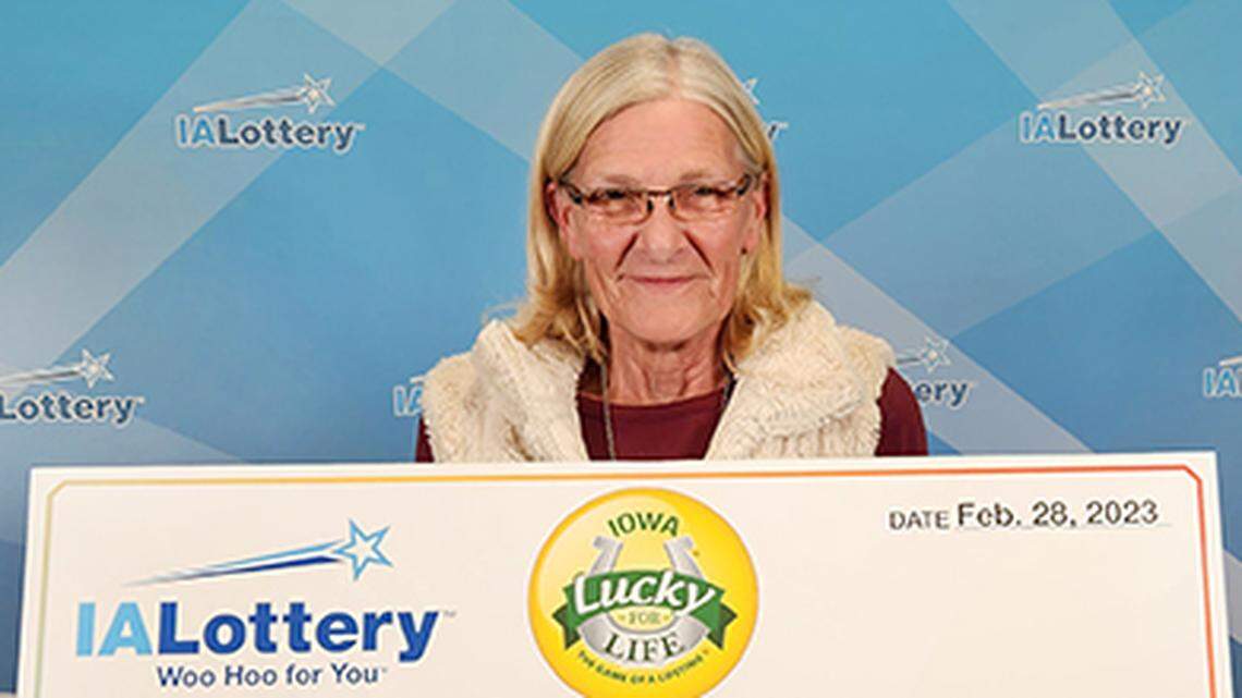 Sheri Wetjen with her over-sized check.