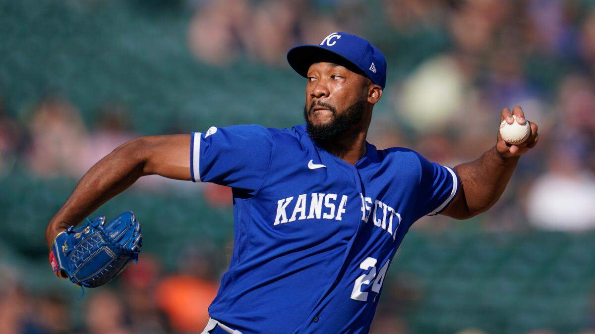 Kansas City Royals relief pitcher Amir Garrett throws against the Detroit Tigers in the sixth inning of a baseball game in Detroit, Saturday, July 2, 2022. (AP Photo/Paul Sancya)
