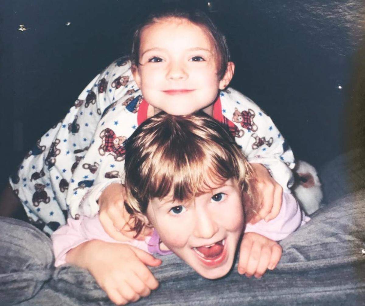 Kansas City Current and U.S. Women’s National Team soccer player Sam Mewis, bottom, and sister Kristie have always shared a close bond.