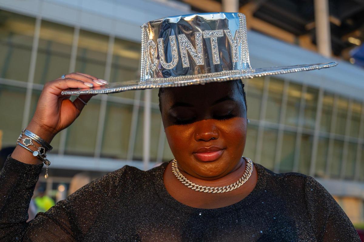 Saviona Goode, from Philadelphia, shows off her silver hat before attending the last stop of Beyoncé’s Renaissance World Tour at GEHA Field at Arrowhead Stadium on Sunday, Oct. 1, 2023, in Kansas City.