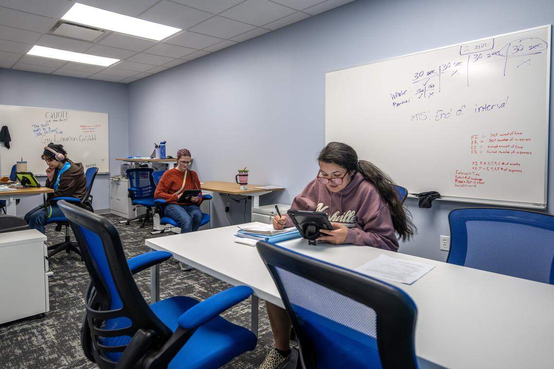 Registered behavioral technicians gather in a workspace at Caravel Autism Health clinic on Wednesday, April 29, 2026, in Liberty.