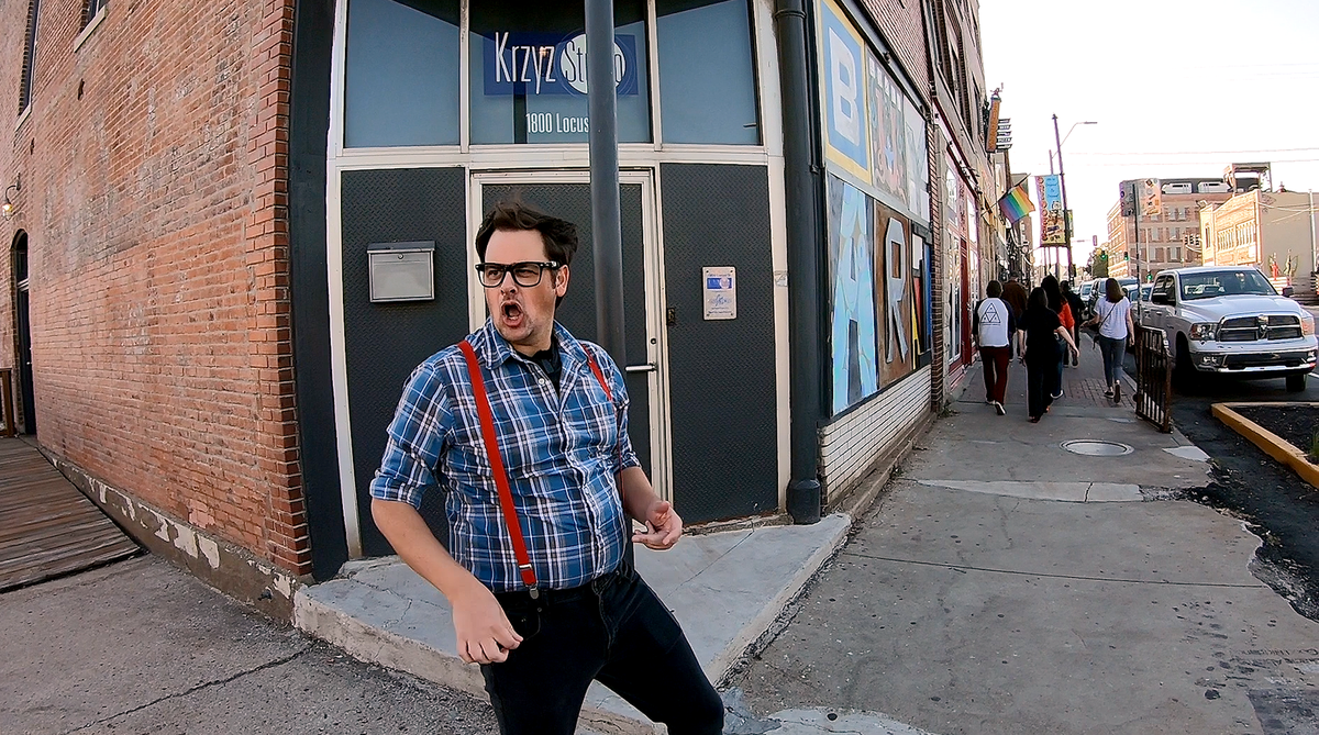 Cole Lindbergh shows off his air guitar skills in the Crossroads.