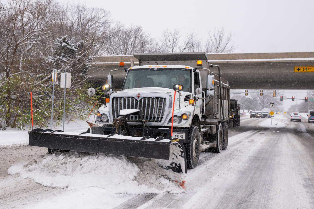 Snow plows were active in Mission as snow blanketed the Kansas City metro area on Monday, Dec. 1, 2025. The area is expected to accumulate 3 to 5 inches.