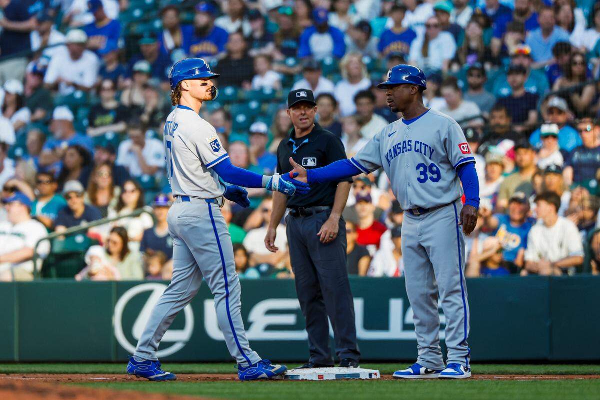 Royals shortstop Bobby Witt Jr., left, got KC on the board with an RBI single to score Kyle Isbel in the third inning of a Monday, June 30, 2025 game against the Mariners at T-Mobile Park in Seattle.