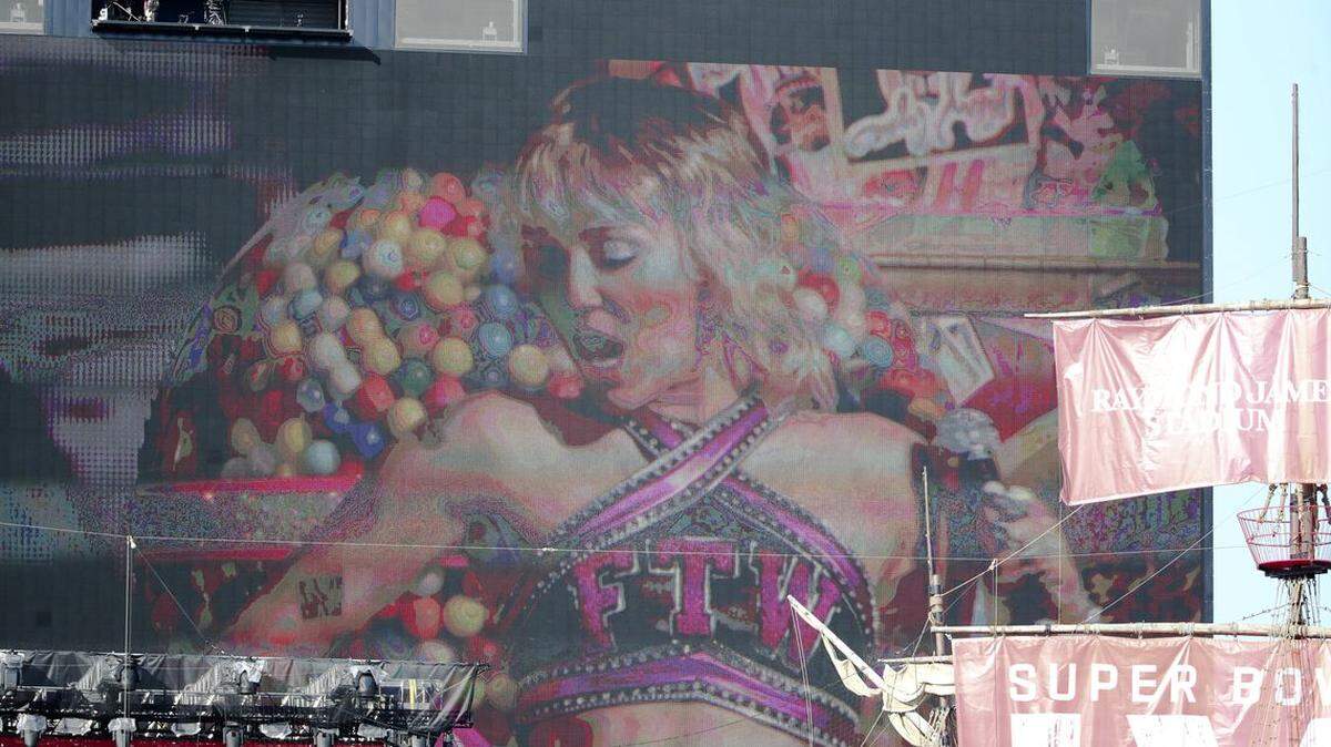 Miley Cyrus warms up before the pregame show for Super Bowl LV between the Kansas City Chiefs and Tampa Bay Buccaneers, Sunday, Feb. 7, 2021, in Tampa, Fla.