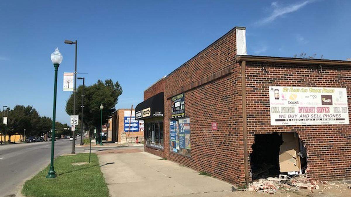 A driver was seriously injured Monday when a car crashed into the side of a clothing store on Independence Ave.