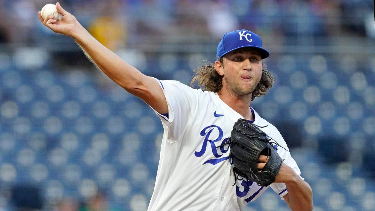 Kansas City Royals starting pitcher Jackson Kowar throws during the first inning of a baseball game against the Cleveland Indians Wednesday, Sept. 1, 2021, in Kansas City, Mo. (AP Photo/Charlie Riedel)