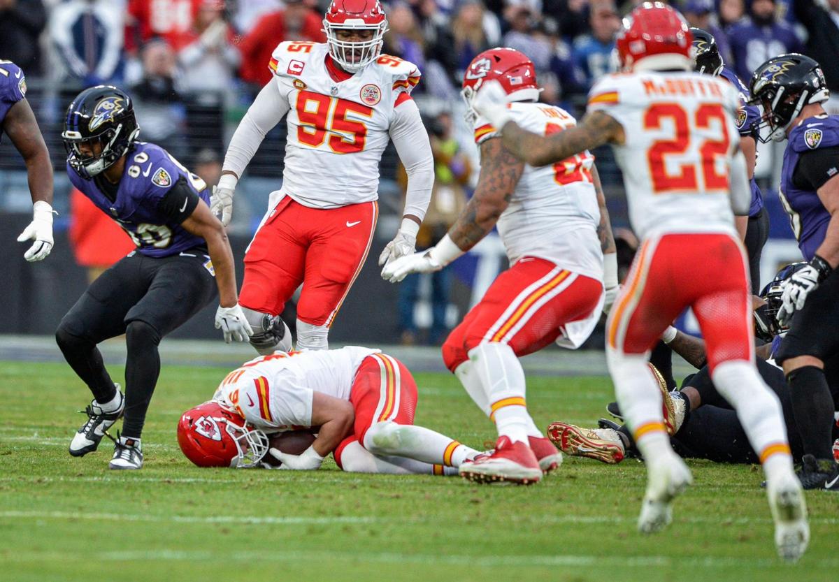 Kansas City Chiefs defensive end George Karlaftis (56) covers a fumble forced by defensive end Charles Omenihu out of the hands of Baltimore Ravens quarterback Lamar Jackson in the second quarter Sunday, Jan. 28, 2024, during the AFC Championship Game in Baltimore.