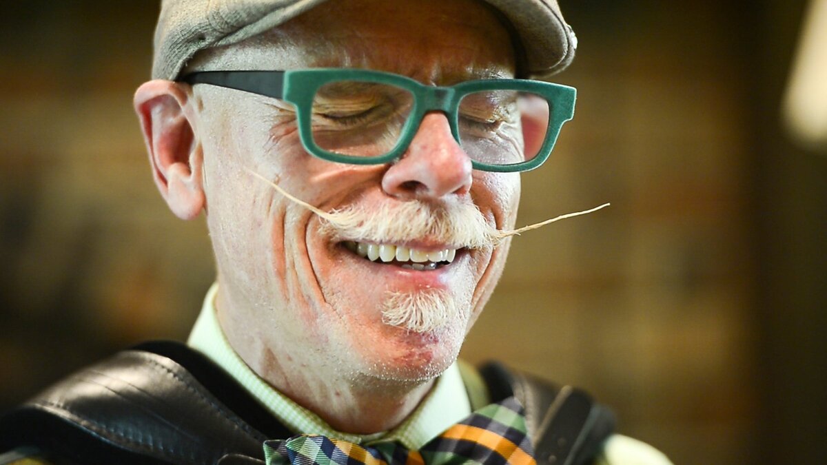 David McGee laughs at himself during his weekly beginner's accordion lesson, which he started a year ago.