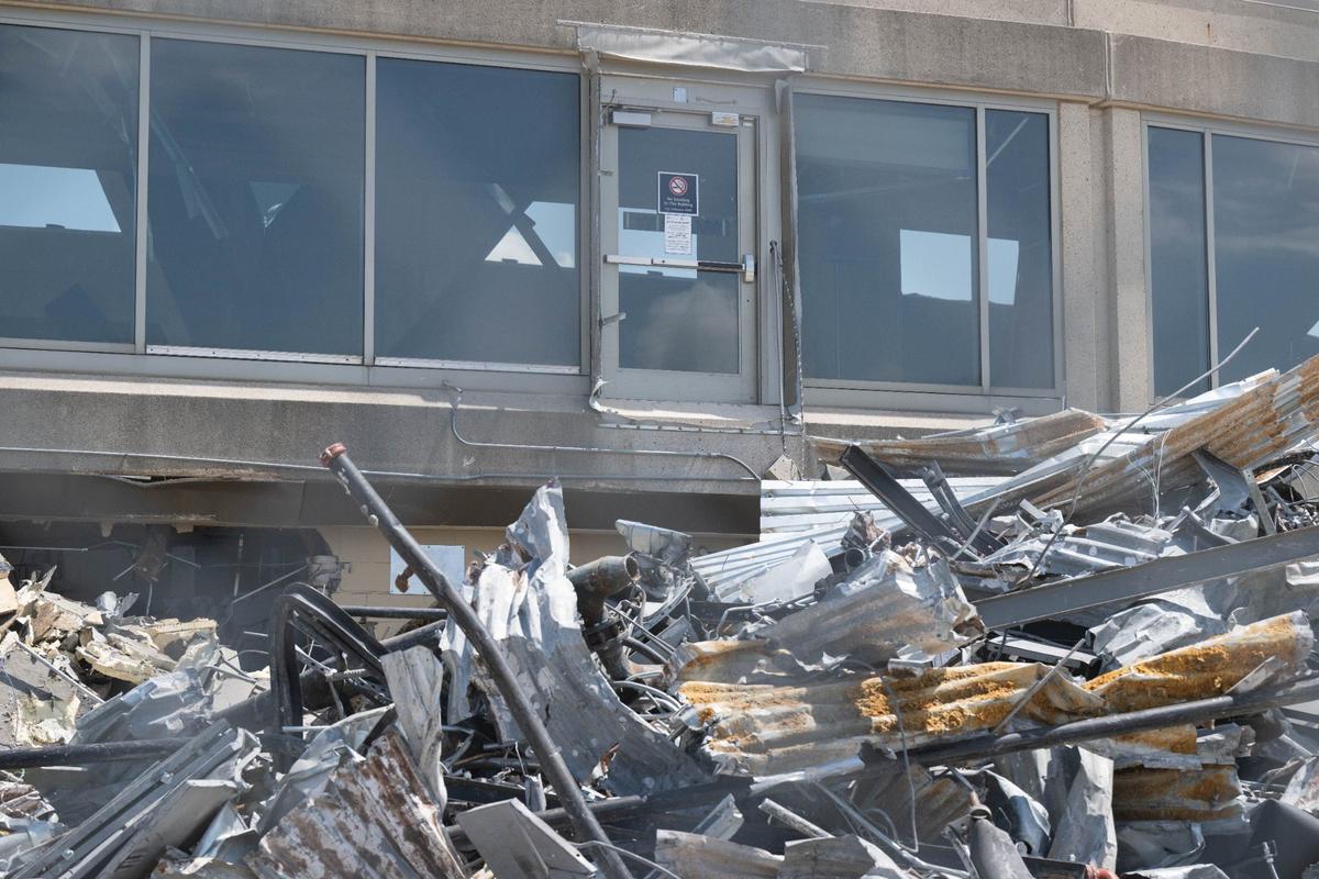Demolition of the old MCI airport terminal in progress, in Kansas City, Missouri on Wednesday, July 17, 2024. Demolition of the old terminals within five years is a condition of the current airline use and lease agreement.