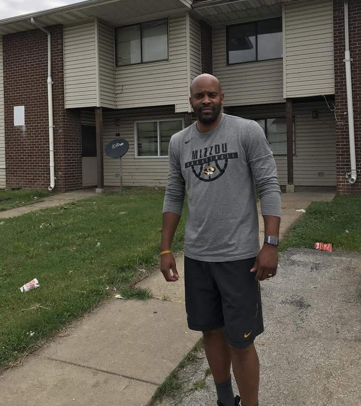 Standing in front of an apartment building in which he lived as a child, the Mizzou men’s basketball coach sees his upbringing in East St. Louis as a point of pride as well as a source of empathy for those living there now.