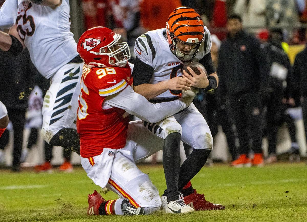 Kansas City Chiefs defensive tackle Chris Jones (95) sacks Cincinnati Bengals quarterback Jake Browning (6) in the second half against the Cincinnati Bengals game on Sunday, Dec. 31, 2023, at GEHA Field at Arrowhead Stadium.