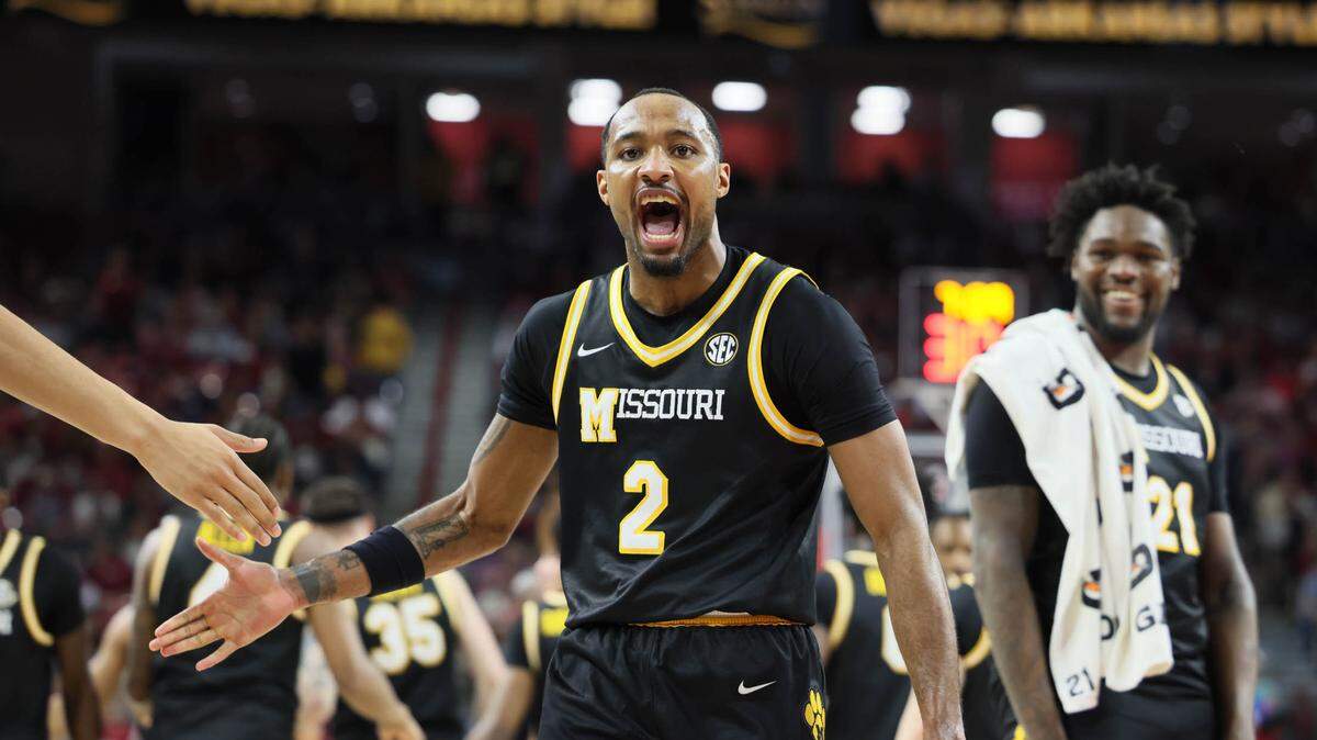 Missouri Tigers guard Tamar Bates (2) celebrates at the end of the first half against the Arkansas Razorbacks at Bud Walton Arena on Feb. 22, 2025.