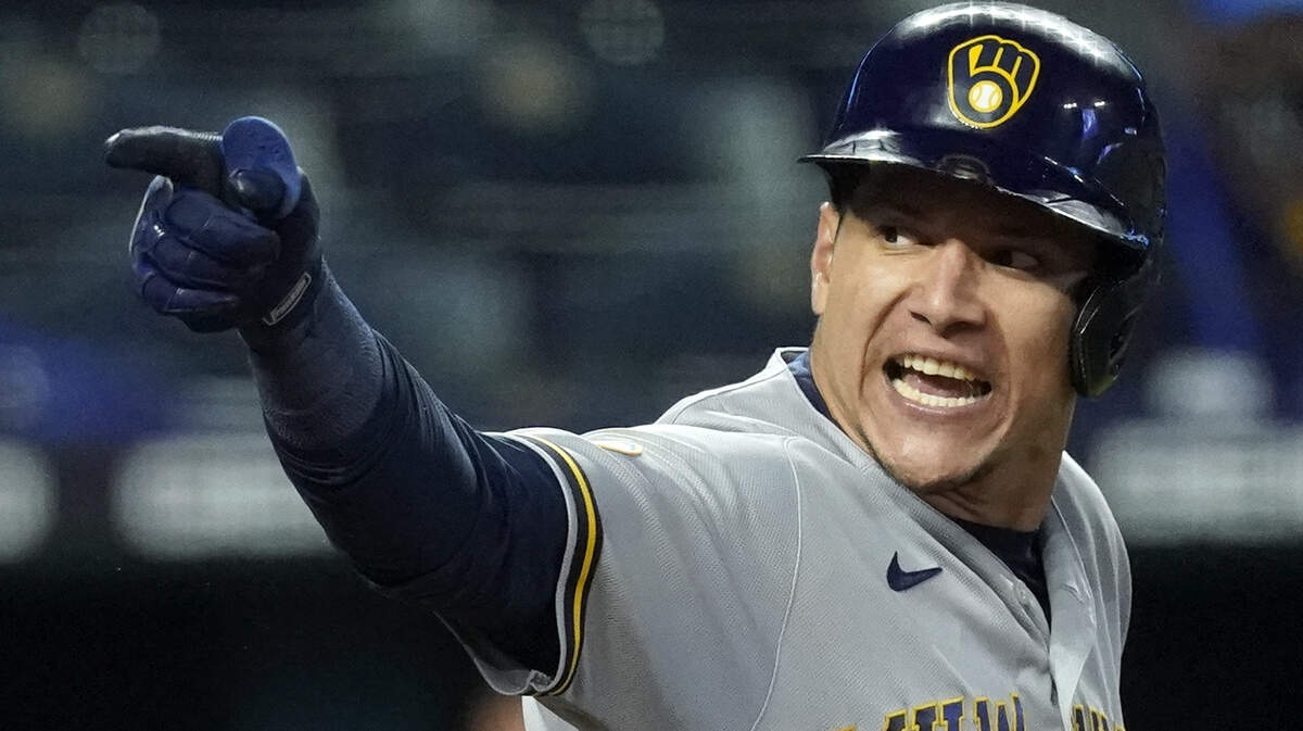 Milwaukee Brewers right fielder Avisail Garcia argues a call with home plate umpire Brian Gorman before getting ejected during the ninth inning of a baseball game against the Kansas City Royals Tuesday, May 18, 2021, in Kansas City, Mo. The Royals won 2-0. (AP Photo/Charlie Riedel)