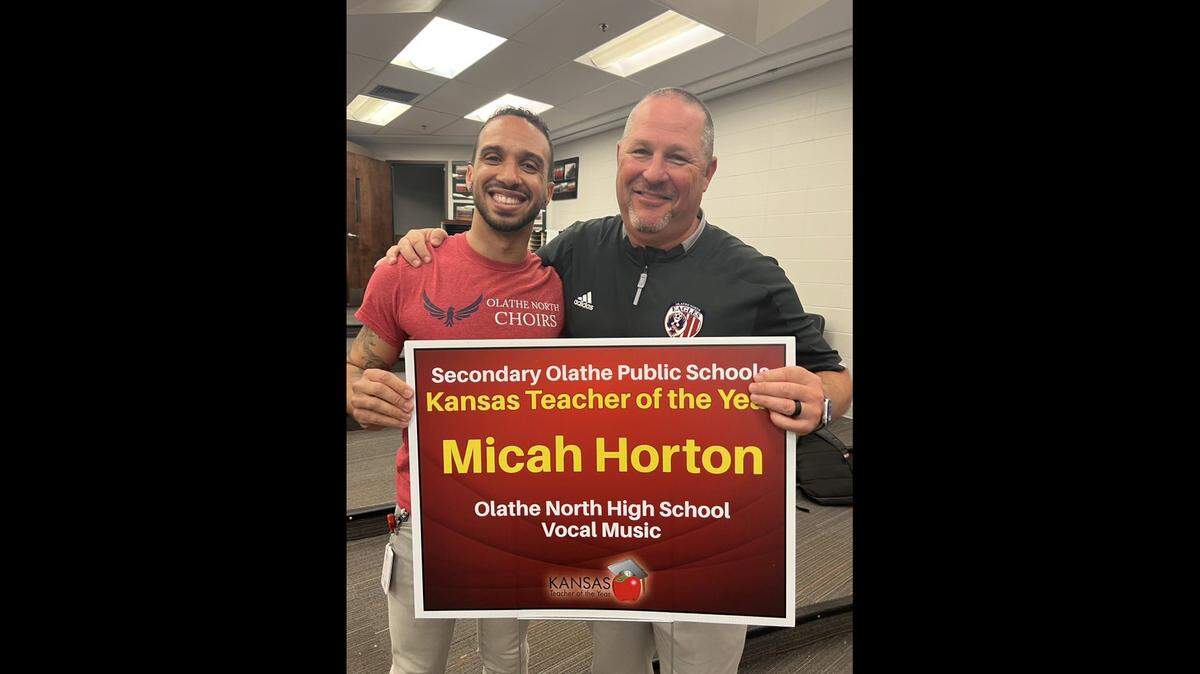 Olathe North teacher Micah Horton, left, posed with Olathe North High School principal Jason Herman when Horton was presented with a teacher of the year award in 2023. Horton was sentenced to 68 months in prison Friday after he pleaded guilty to two counts of unlawful sexual relations in January.