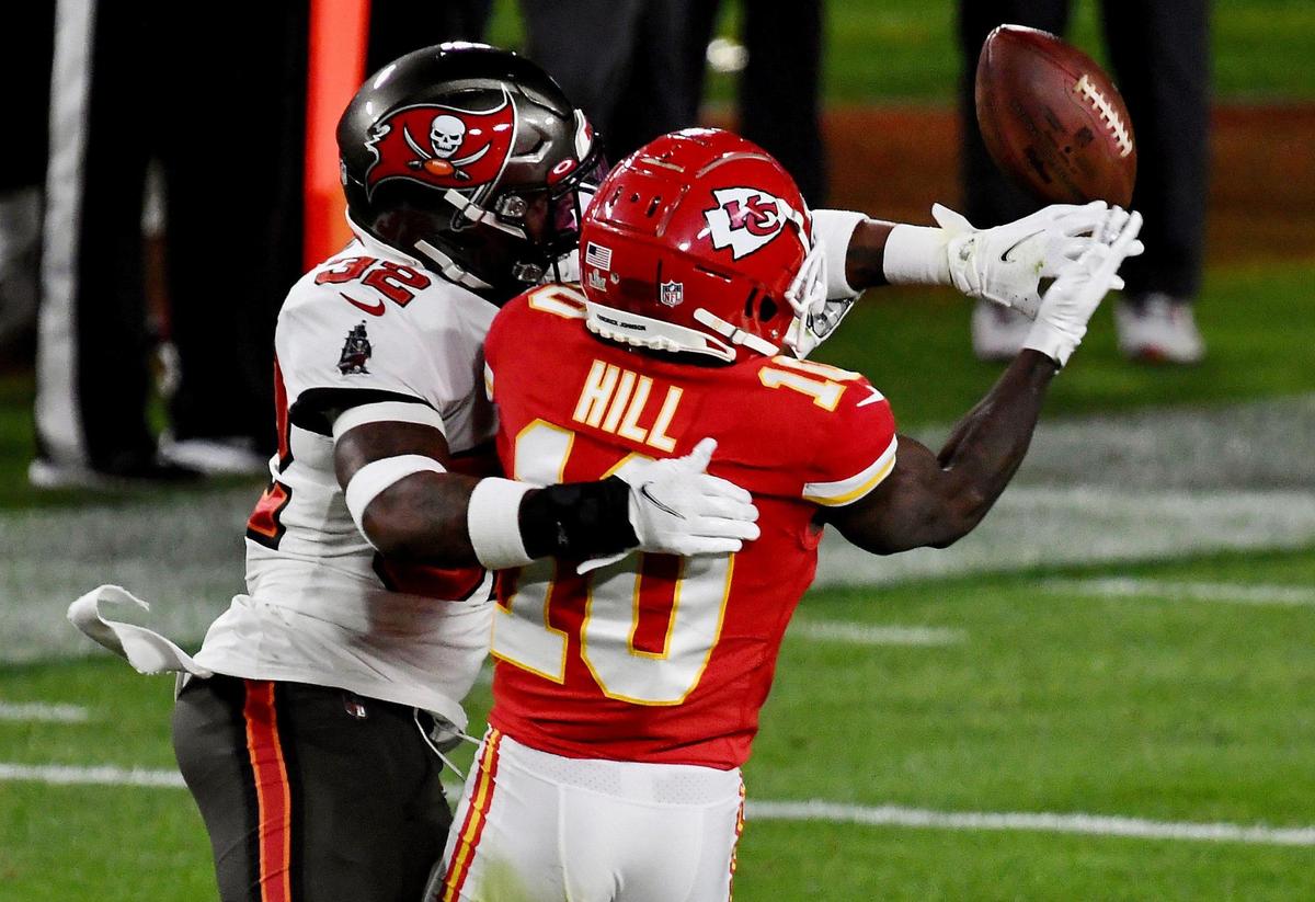 Tampa Bay Buccaneers safety Mike Edwards forced an interception when he knocked the ball away from Kansas City Chiefs wide receiver Tyreek Hill in the third quarter Sunday, February 7, 2021, at Super Bowl LV at Raymond James Stadium in Tampa, Florida.
