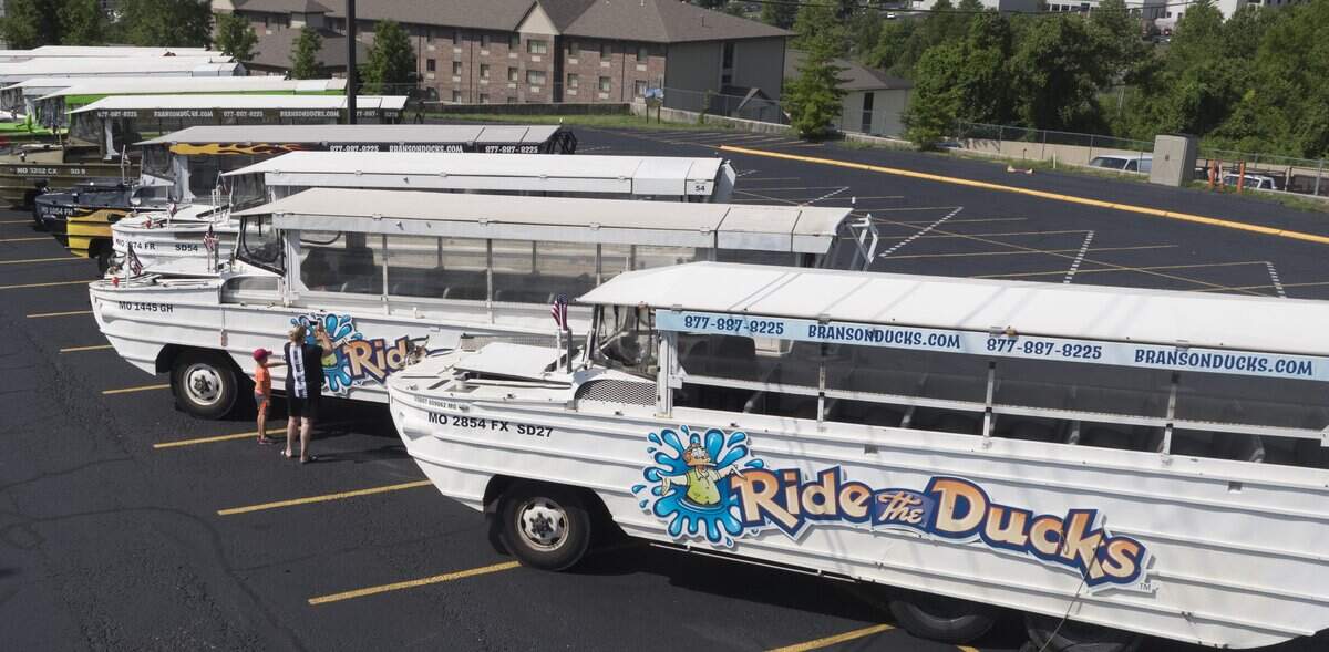 Boats in the parking lot of Ride The Ducks in Branson on Friday.