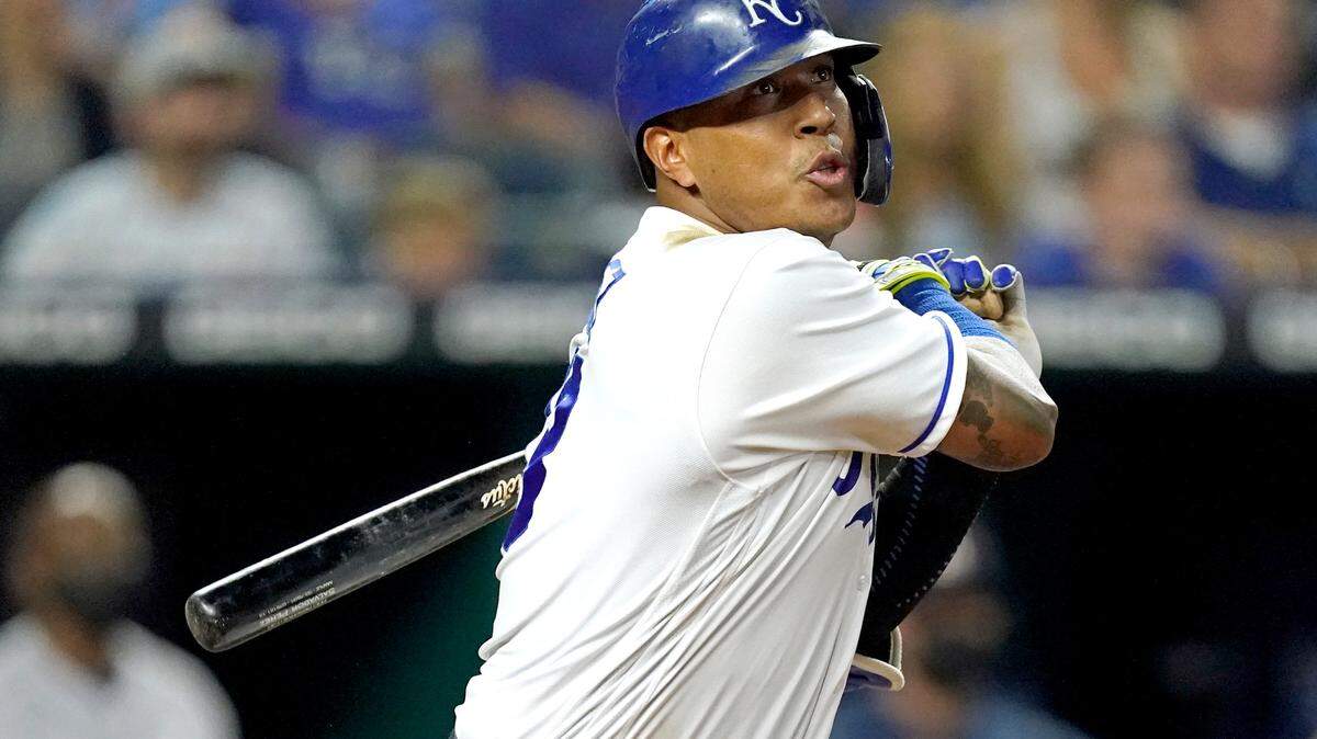 Kansas City Royals’ Salvador Perez hits aq two-run single during the eighth inning of a baseball game against the Houston Astros Monday, Aug. 16, 2021, in Kansas City, Mo. (AP Photo/Charlie Riedel)
