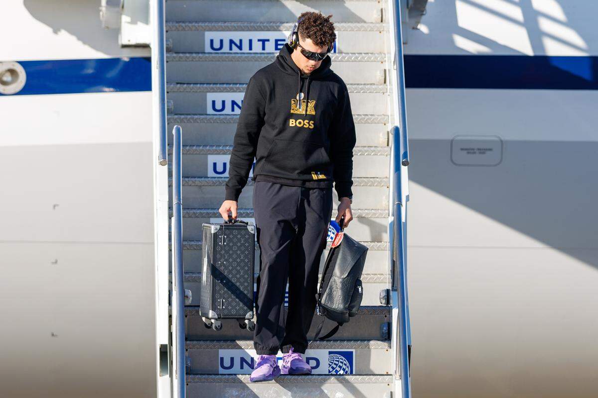 Kansas City Chiefs quarterback Patrick Mahomes (15) exits the plane after arriving at Louis Armstrong New Orleans International Airport on Feb. 2, 2025.