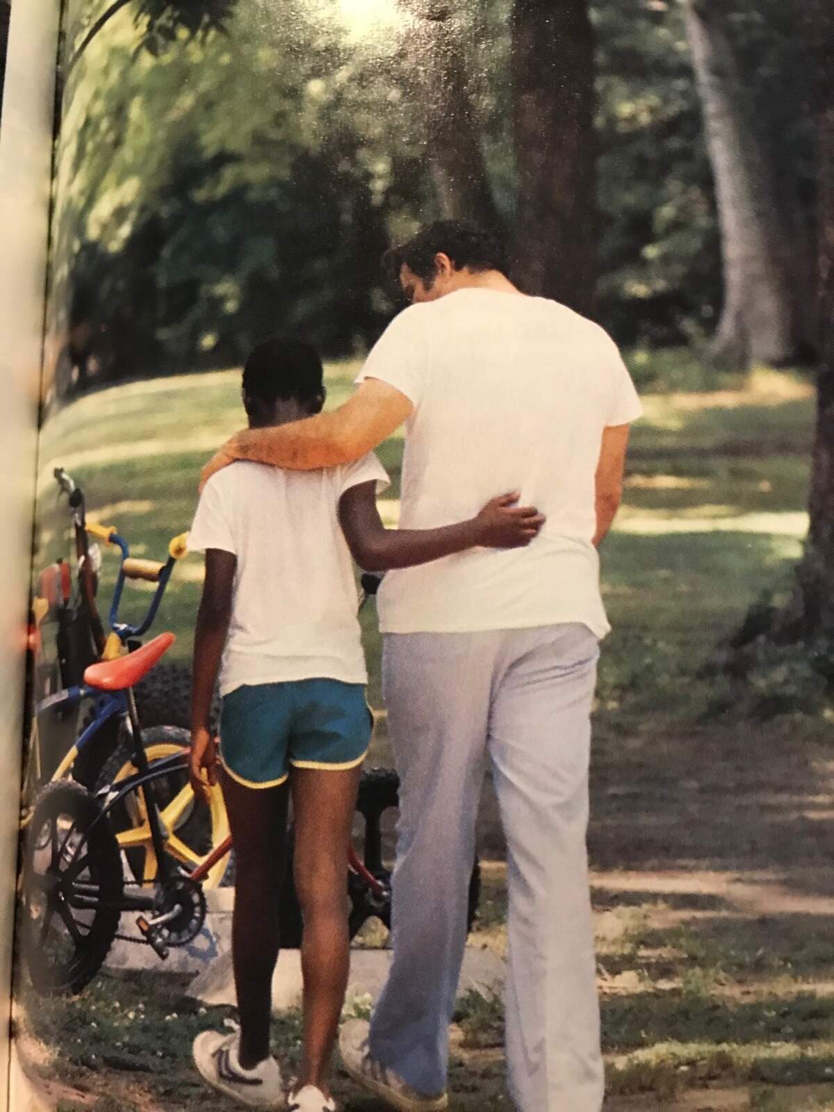 Johnny Robinson (right) was featured in a 1984 edition of NFL Game Day magazine for his work with troubled boys.