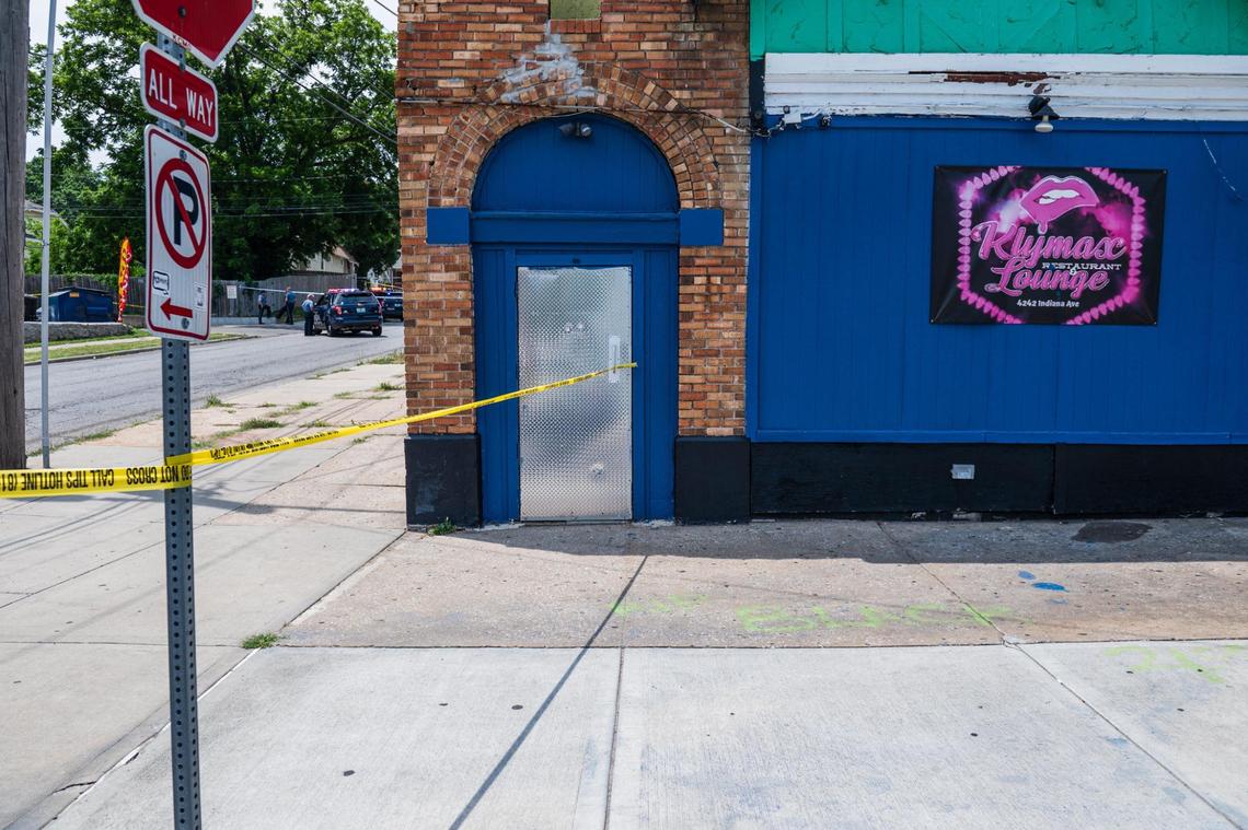 Police tape blocks off the corner of 43rd Street and Indiana Avenue near Klymax Lounge as police investigate a scene where one person was killed following a shooting near 43rd Street and College Avenue on Friday, June 30, 2023, in Kansas City. Kylmax Lounge was the scene of a deadly shooting in May where three people dead and two injured.