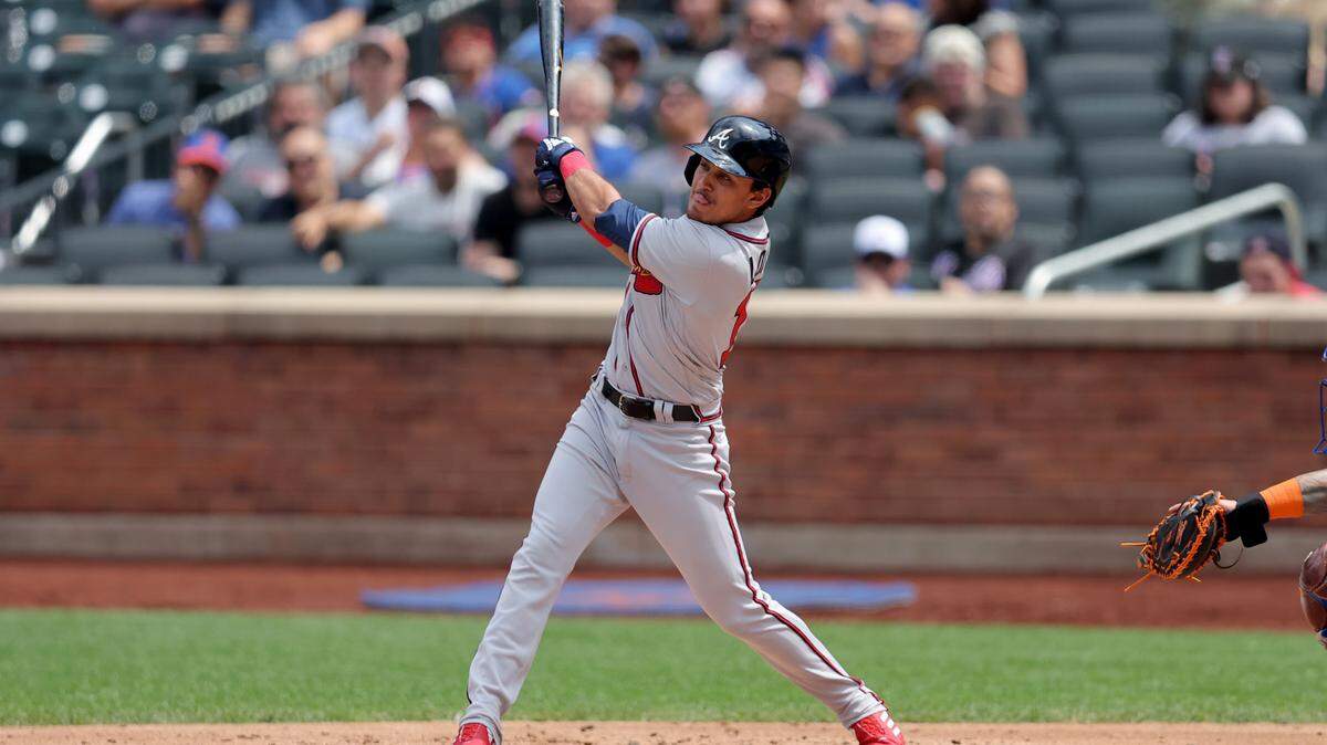 Atlanta Braves shortstop Nicky Lopez (15) follows through on an RBI double against the New York Mets during the second inning at Citi Field.