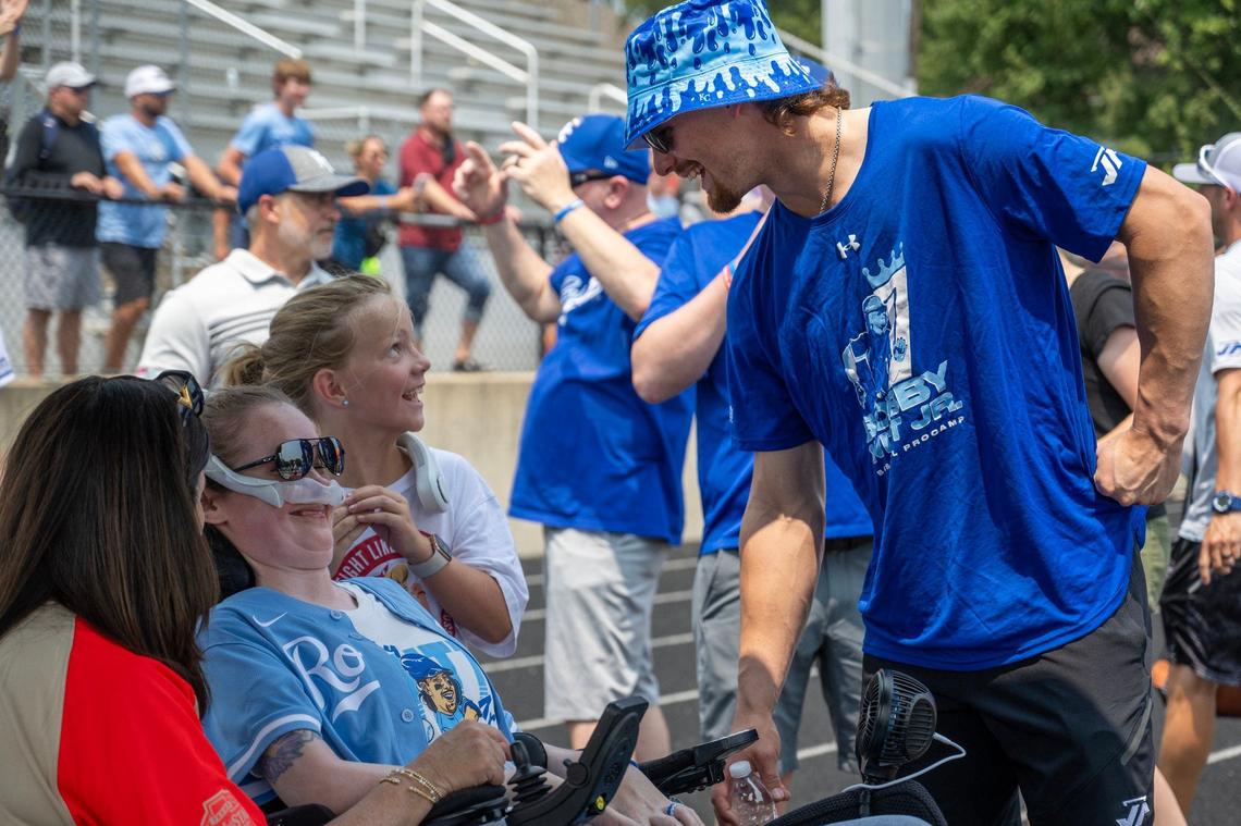 Sarah Nauser, left, speaks to Kansas City Royals shortstop Bobby Witt Jr. during the Bobby Witt Jr. Youth Baseball ProCamp meet at Bishop Miege High School on Thursday, July 25, 2024, in Roeland Park, Kansas.
