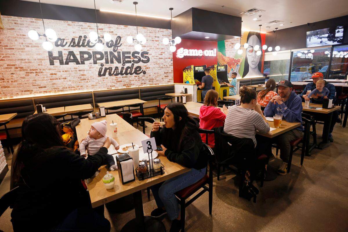 Peter Piper Pizzeria employees and customers take part in a soft opening of the restaurant’s new location in the Kansas City area on Wednesday, Mar. 8, 2023 in Olathe.