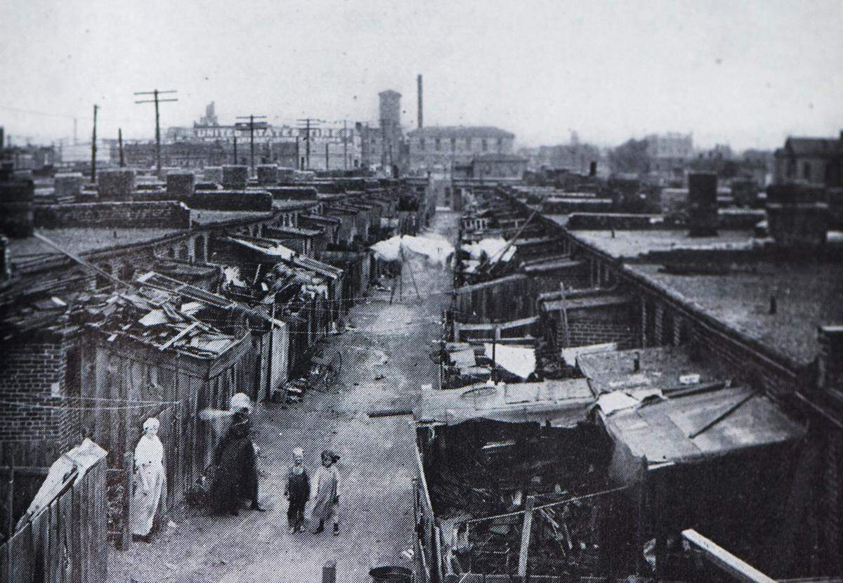 McClure Flats was a slum in Kansas City that had such deplorable conditions that health officials ordered the buildings torn down in 1919 to help fight the spread of influenza during the pandemic.