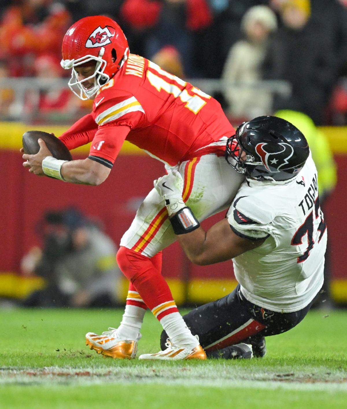 Chiefs quarterback Patrick Mahomes is sacked by Houston Texans linebacker Henry To'Oto'O during a Sunday, Dec. 7, 2025 NFL game at GEHA Field at Arrowhead Stadium in Kansas City.