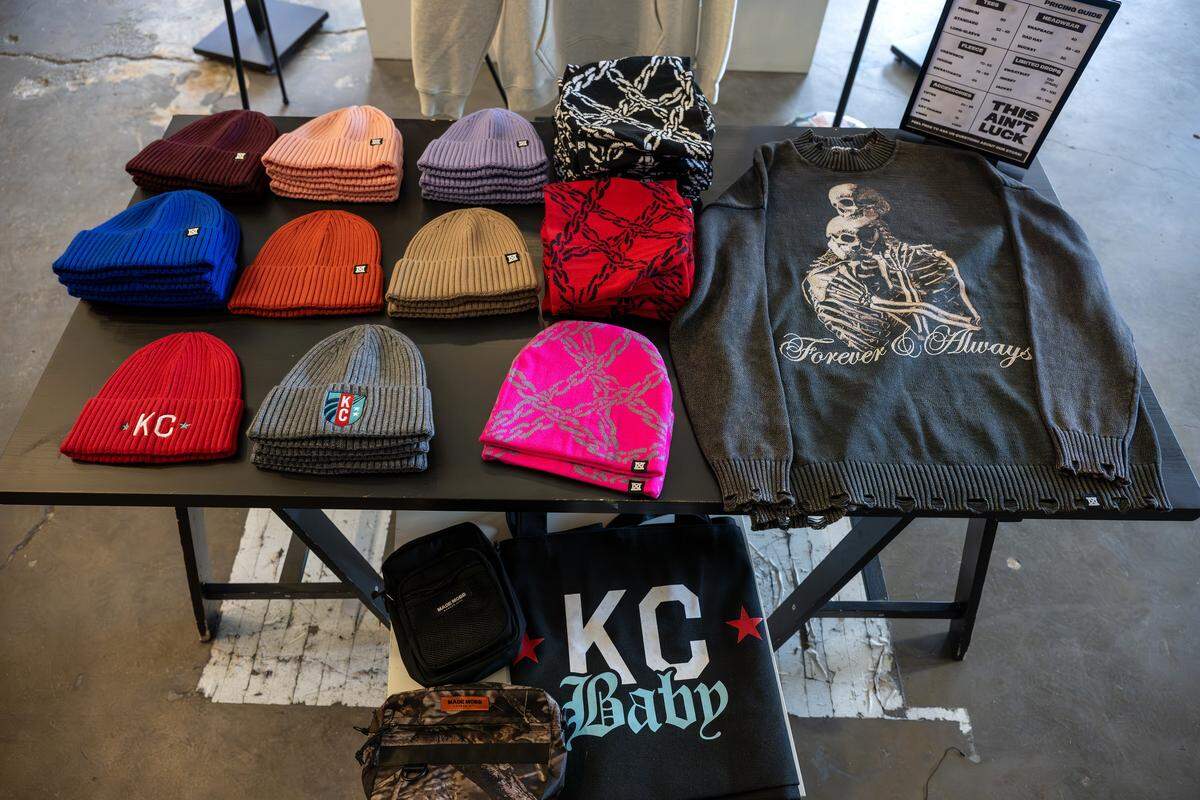 A variety of beanies and other merchandise are displayed on a table at Made Mobb on Wednesday, March 18, 2026, in Kansas City.