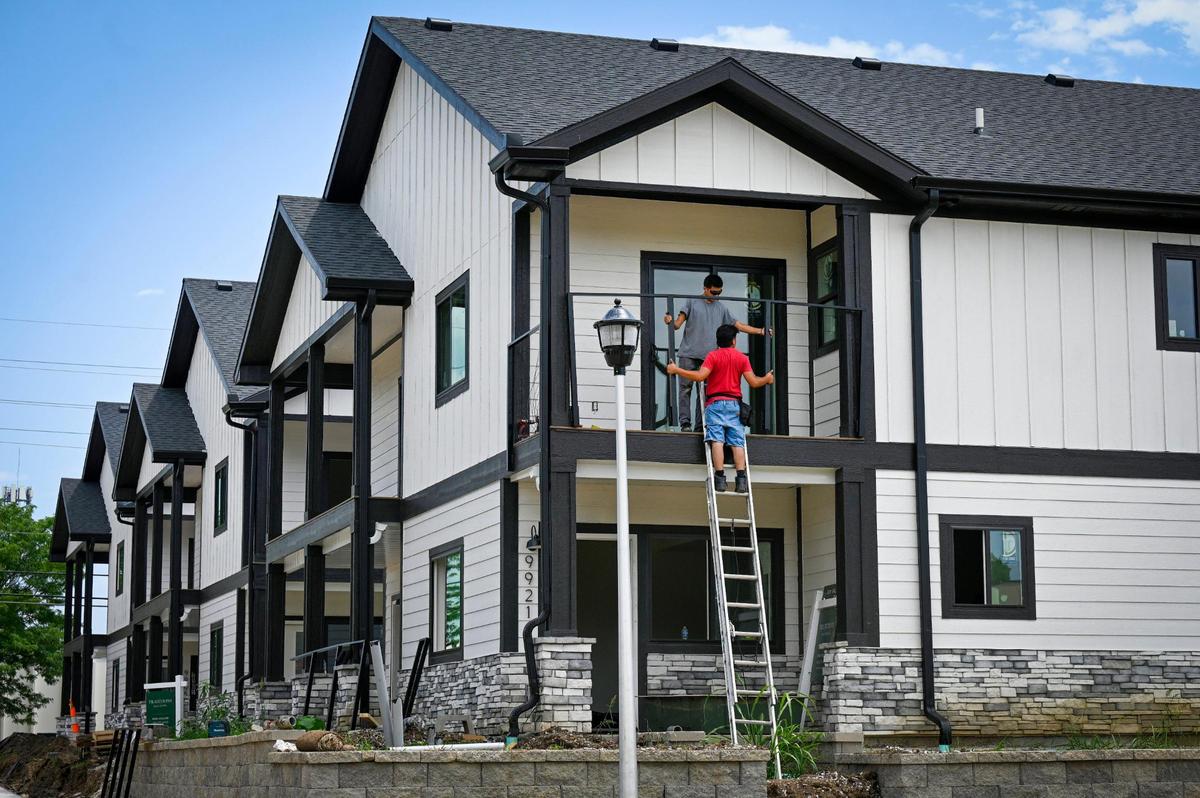 Overland Park neighbors fought against a townhome complex, now under construction on two acres at West 88th and Farley streets in northern Overland Park. Prices are expected to start at $425,000 for a three-bedroom townhome. 