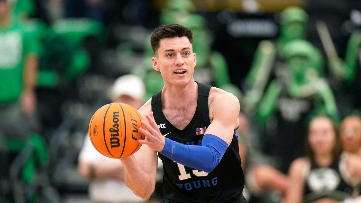 BYU guard Alex Barcello brings the ball up court in the first half during an NCAA college basketball game against Utah Valley Wednesday, Dec. 1, 2021, in Orem, Utah. (AP Photo/Rick Bowmer)