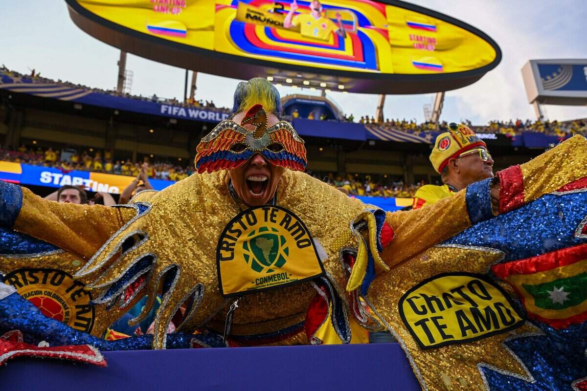 A Colombian fan cheers before kickoff at the Colombia vs. Ghana 2026 World Cup round of 32 football match at Kansas City (Arrowhead) Stadium in Kansas City on Friday, July 3, 2026.