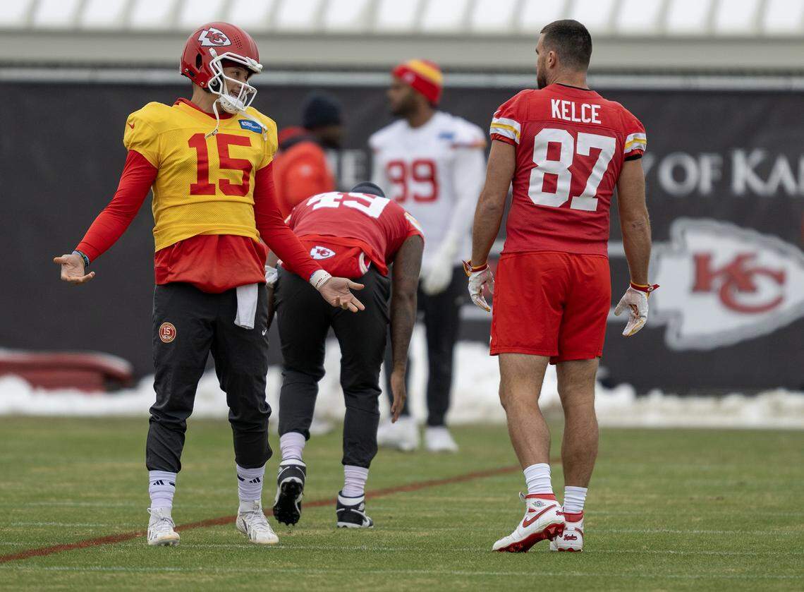 Chiefs quarterback Patrick Mahomes (15) and tight end Travis Kelce (87) stretch during practice on Wednesday, Dec. 3, 2025, in Kansas City.
