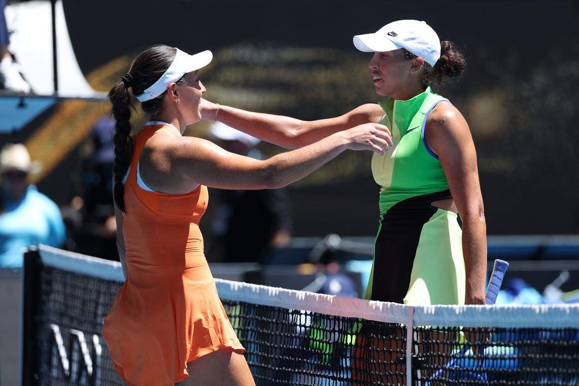USA's Jessica Pegula (L) and USA's Madison Keys embrace after their women's singles match on day nine of the Australian Open tennis tournament in Melbourne on January 26, 2026.