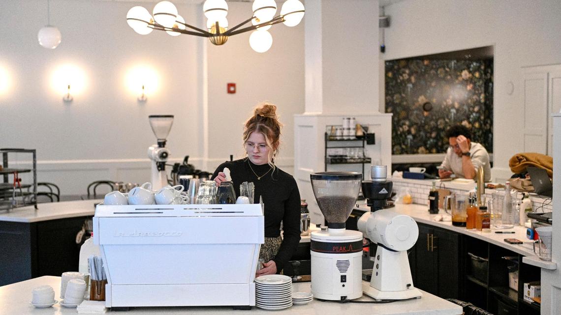 Hanna Desmarteau, manager at Post Coffee Company, prepares a beverage on Tuesday, Nov. 15, 2022, in Kansas City.