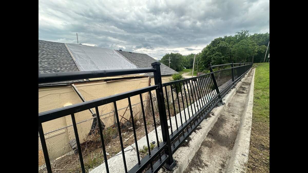 The Clay-Ray veterans hall’s roof is parallel to St. Louis Avenue, which is part of Missouri State Highway 10. Only a decorative black fence, bent back from the most recent crash, separates the top of the building from traffic.