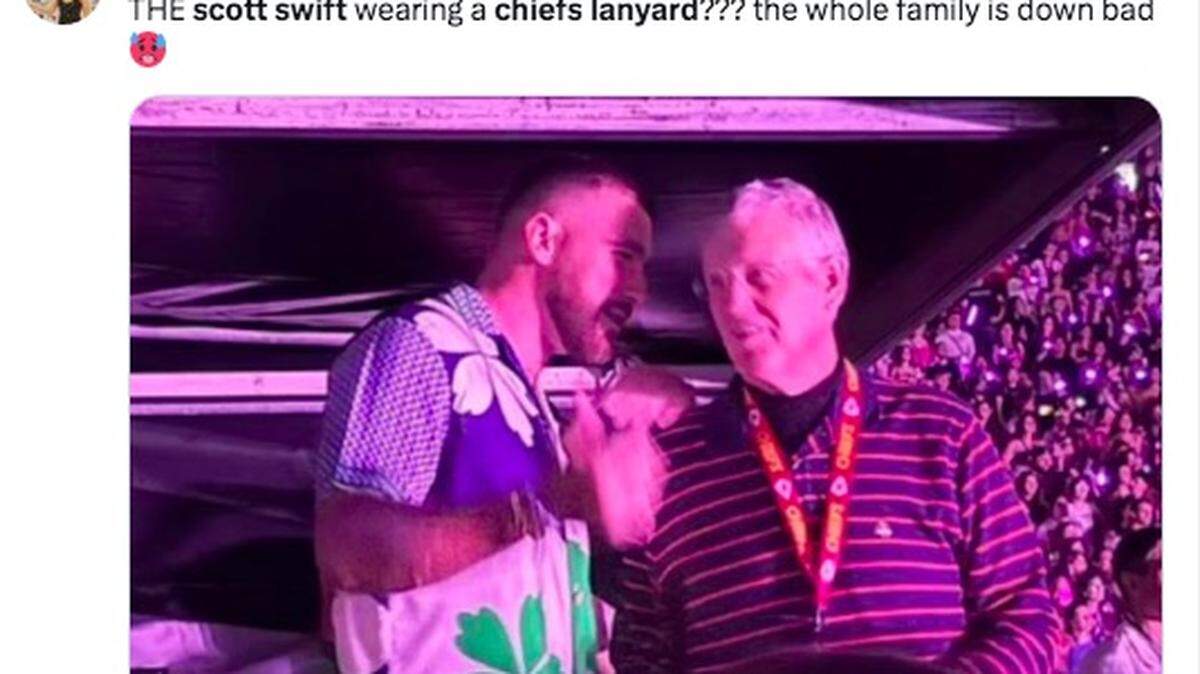 Taylor Swift’s father, Scott Swift, right, a Philadelphia Eagles fan, wore a red Kansas City Chiefs lanyard as he watched her Buenos Aires show Saturday night with her new boyfriend, Chiefs’ star Travis Kelce.