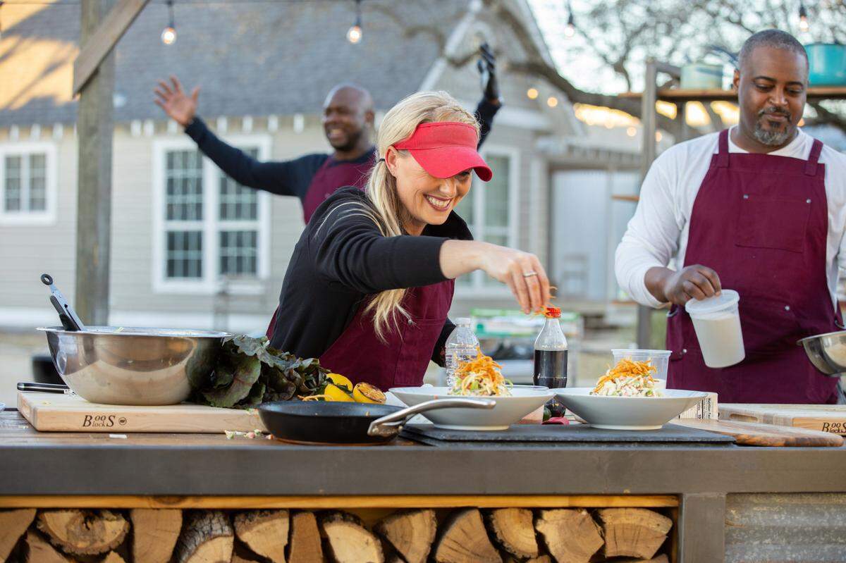 Megan Day of Lee’s Summit adds the finishing touches to her Team Brawl dish, as seen on “BBQ Brawl,” Season 2.